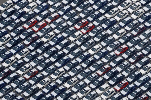 This photo shows vehicles bound for foreign countries at a logistics center in Kawasaki near Tokyo, Thursday, March 27, 2025. (Michi Ono/Kyodo News via AP)