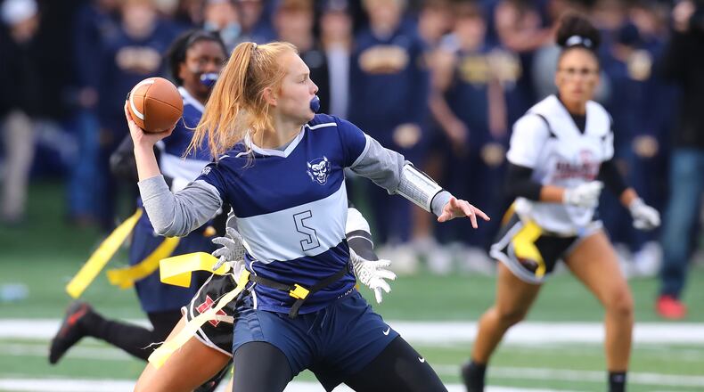120921 Atlanta: Marietta quarterback Claire Hennessey passes against Hillgrove, who were able to intercept Marietta multiple times, in their GHSA Flag Football Championship Division 3 game on Thursday, Dec 9, 2021, in Atlanta.   “Curtis Compton / Curtis.Compton@ajc.com”`