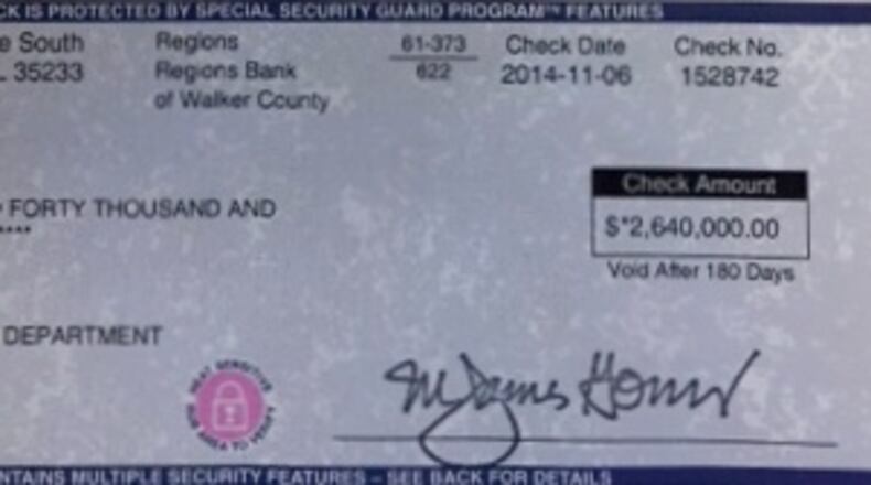 The check, delivered to Cobb County by the Atlanta Braves to pay for permit fees for the team's mixed-use development.