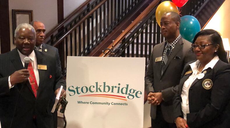 Stockbridge City Council leaders announce new branding campaign Monday during City Hall ceremony.