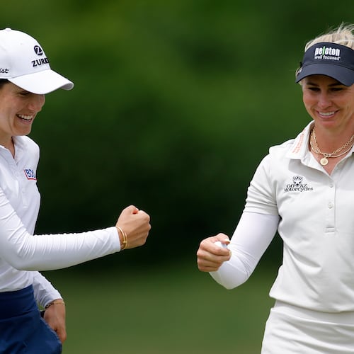 Ryann O'Toole, right, and Albane Valenzuela, left, celebrate on the 16th green during the first round of the Dow Championship LPGA golf tournament, Thursday, June 11, 2026, at Midland Country Club in Midland, Mich. (AP Photo/Al Goldis)
