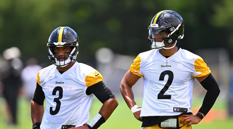 Russell Wilson (3) looks on alongside Justin Fields (2) of the Pittsburgh Steelers during the Pittsburgh Steelers OTA offseason workout at UPMC Rooney Sports Complex on June 6, 2024, in Pittsburgh. (Joe Sargent/Getty Images/TNS)