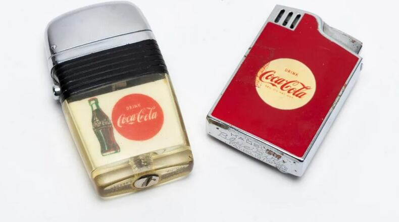 More than 400 lots are featured in the online auction, including a group of Coca-Cola lighters. (LiveAuctioneers.com)