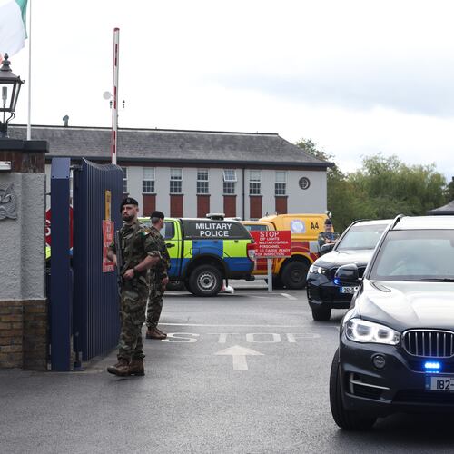 Garda vehicles leaving Casement Aerodrome, Baldonnell, Ireland, Sunday, Aug. 9, 2026, where a Irish government plane believed to be carrying Daniel Kinahan landed, following him being extradited from Dubai, to face a charge of directing an organized crime group. (Damien Eagers/PA via AP)