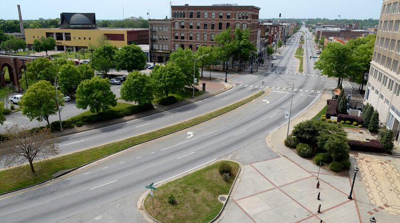 04/05/20 - Macon - Jenna Eason / jennaeasonphotography@gmail.com
The intersection of Martin Luther King Jr. Boulevard and Cherry Street in downtown Macon sits empty on Sunday, Apr. 5. Georgia Gov. Brian Kemp issued a shelter-in-place executive order that went into effect Friday, Apr. 3. Jenna Eason / jennaeasonphotography@gmail.com