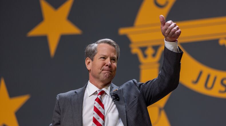 Gov. Brian Kemp waves before he leaves the stage at his inauguration ceremony at Georgia State University Convocation Center in Atlanta on Thursday, Jan. 12, 2023, where he talked about his pay raise proposal for teachers. (Arvin Temkar / arvin.temkar@ajc.com)