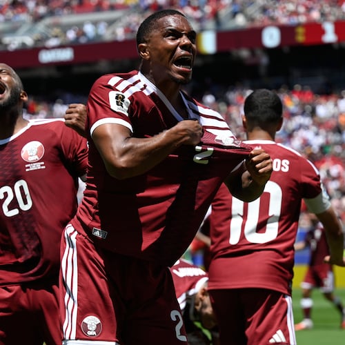 Qatar's Pedro Miguel, yells as he celebrates after teammate Qatar's Boualem Khoukhi, scored his sides first goal during the World Cup Group B soccer match between Qatar and Switzerland in Santa Clara, Calif., near San Francisco, Saturday, June 13, 2026. (AP Photo/Eakin Howard)