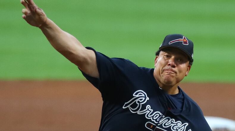 Braves pitcher Bartolo Colon threw a called strike in the first pitch of the first game at SunTrust Park, an 8-5 exhibition win Friday against the Yankees. (Curtis Compton/ccompton@ajc.com)