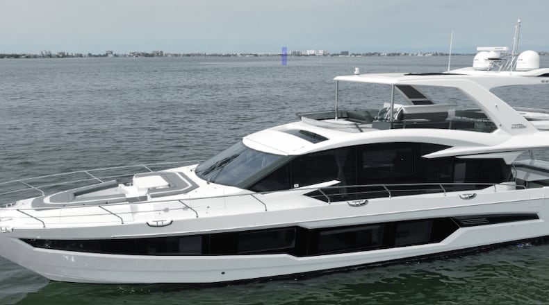 Federal officials say an Alpharetta company's fraudulant scheme led to lavish spending by the founder, including purchase of this yacht.