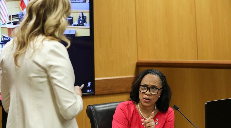 Fulton County District Attorney Fani Willis testifies during a hearing in the case of the State of Georgia v. Donald John Trump at the Fulton County Courthouse on Thursday, Feb. 15, 2024, in Atlanta. Judge Scott McAfee is hearing testimony as to whether Willis and Special Prosecutor Nathan Wade should be disqualified from the case for allegedly lying about a personal relationship. (Alyssa Pointer/Pool/Getty Images/TNS)