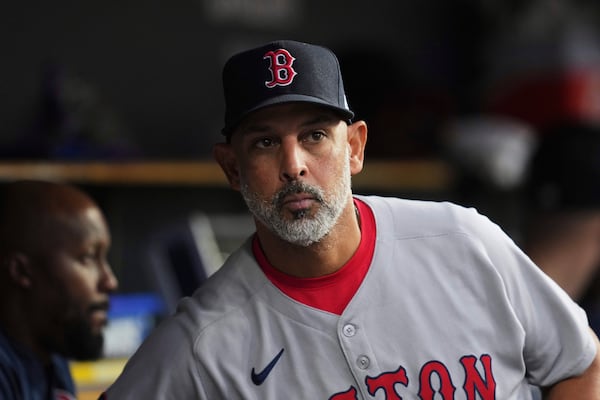 Boston Red Sox manager Alex Cora watches against the Detroit Tigers in the fifth inning during a baseball game, Monday, May 12, 2025, in Detroit. (AP Photo/Paul Sancya)