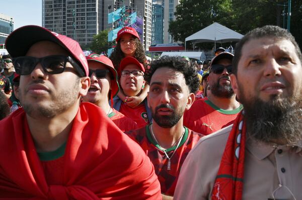 Local Moroccan fans react as they watch the match against Brazil on a screen during a watch party at the FIFA Fan Festival in Centennial Olympic Park on Saturday, June 13, 2026, in Atlanta. (Hyosub Shin/AJC)