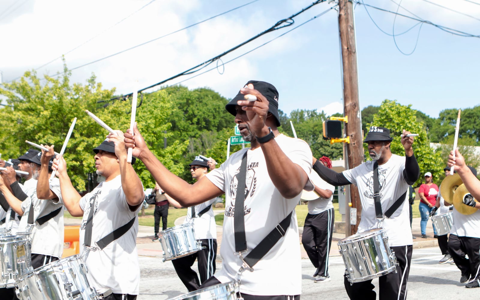 Members of the Atlanta Old School Drummers march during the Atlanta Public School parade on Saturday, April 22, 2023. The parade celebrated the 150th anniversary of Atlanta Public Schools and featured students, teachers and other members of the APS community. CHRISTINA MATACOTTA FOR THE ATLANTA JOURNAL-CONSTITUTION
