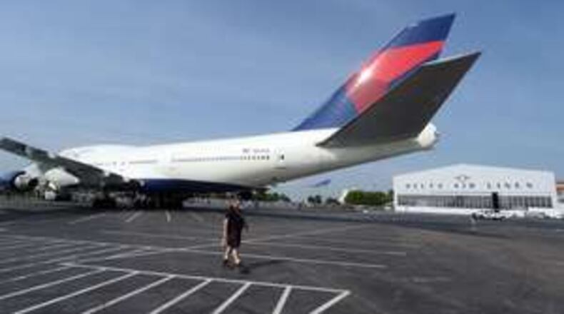 Delta Air Lines’ efforts to tame its jet fuel bills have added costly complications in recent years. KENT D. JOHNSON /kdjohnson@ajc.com