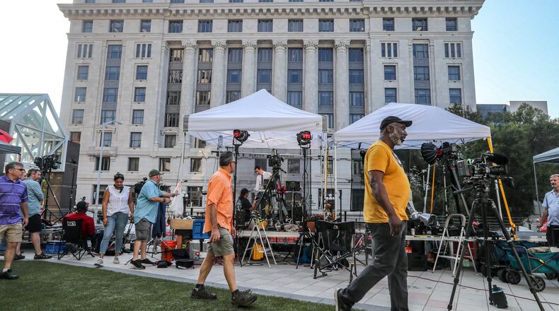August 14, 2023 Atlanta: On Monday, Aug. 14, 2023 Television crews lined up along Pryror Street and in front of the Fulton County Administration building as sheriff’s cruisers and deputies on motorcycles were blocking the entrances to Pryor Street in the block in front of the Fulton County courthouse entrance where the case against former president, Donald Trump and others were presented before the grand jury. Outside an encampment of television news crews in their tents were doing their updates and reports from the street. Officials have tightened security in recent weeks, installing orange barricades and metal fencing and shutting down streets surrounding the courthouse to traffic and parking. Sheriff Pat Labat declined to provide any further details on his agency’s security plan, telling reporters “we look forward to the opportunity to show the world that we are ready.”  (John Spink / John.Spink@ajc.com)