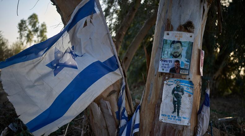 A memorial site at the spot where Ran Gvili, the last hostage in the Gaza Strip, was killed while fighting Hamas militants, stands in Kibbutz Alumim, Israel, Thursday, Dec. 4, 2025. (AP Photo/Ohad Zwigenberg)
