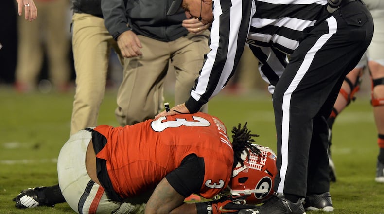 Georgia Bulldogs running back Todd Gurley was shaken up on a play late in the fourth quarter against Auburn on Saturday, Nov. 15, 2014.