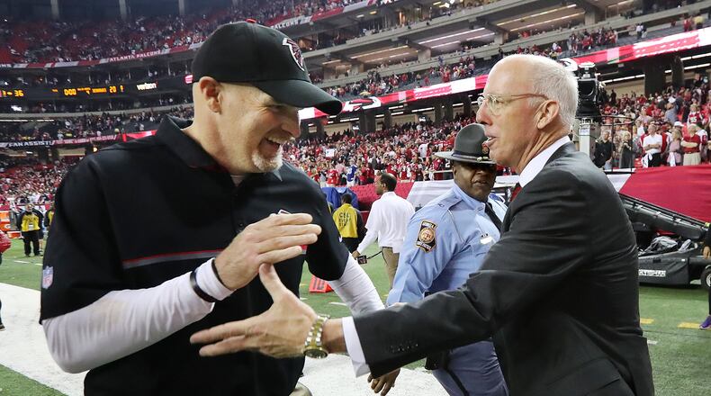 January 14, 2017, Atlanta: Falcons head coach Dan Quinn and Falcons president Rich McKay celebrate a 36-20 victory over the Seahawks during a NFL football NFC divisional playoff game on Saturday, Jan. 14, 2017, in Atlanta. Curtis Compton/ccompton@ajc.com