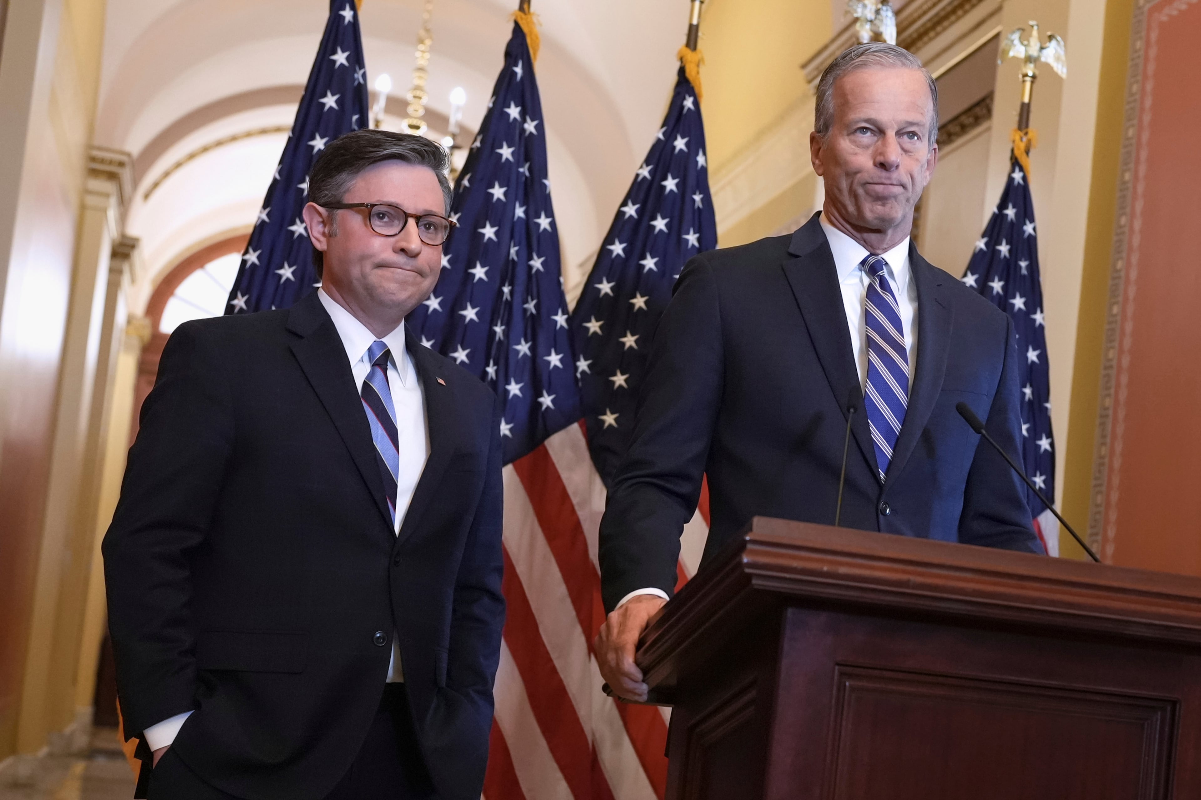 House Speaker Mike Johnson, R-La., (left) and Senate Majority Leader John Thune, R-S.D., blame Democrats for the government shutdown.