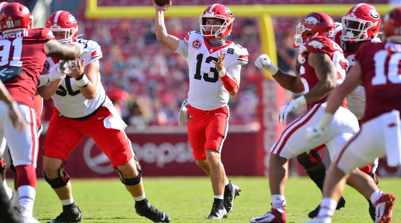 Georgia quarterback Stetson Bennett (13) during the Bulldogs' game with Arkansas in Fayetteville, Ark., on Saturday, Sept. 26, 2020. (Photo by Walt Beazley)