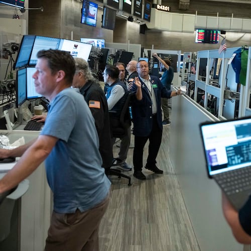 Options trader Matthew Hefter works on the floor of the New York Stock Exchange, Thursday, Aug. 27, 2026, in New York. (AP Photo/Yuki Iwamura)
