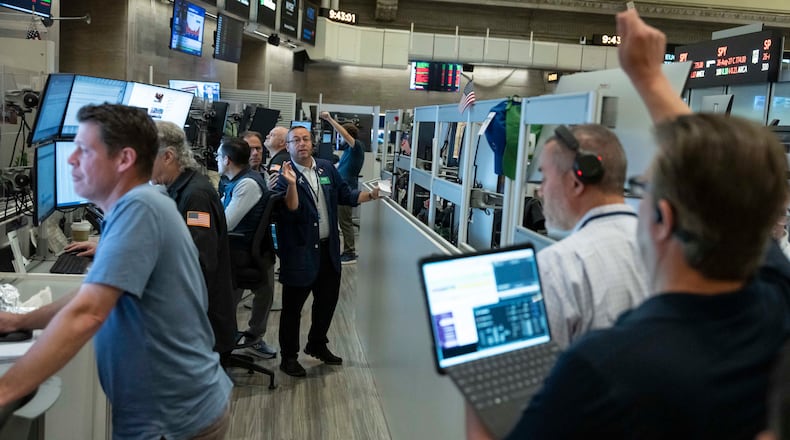 Options trader Matthew Hefter works on the floor of the New York Stock Exchange, Thursday, Aug. 27, 2026, in New York. (AP Photo/Yuki Iwamura)