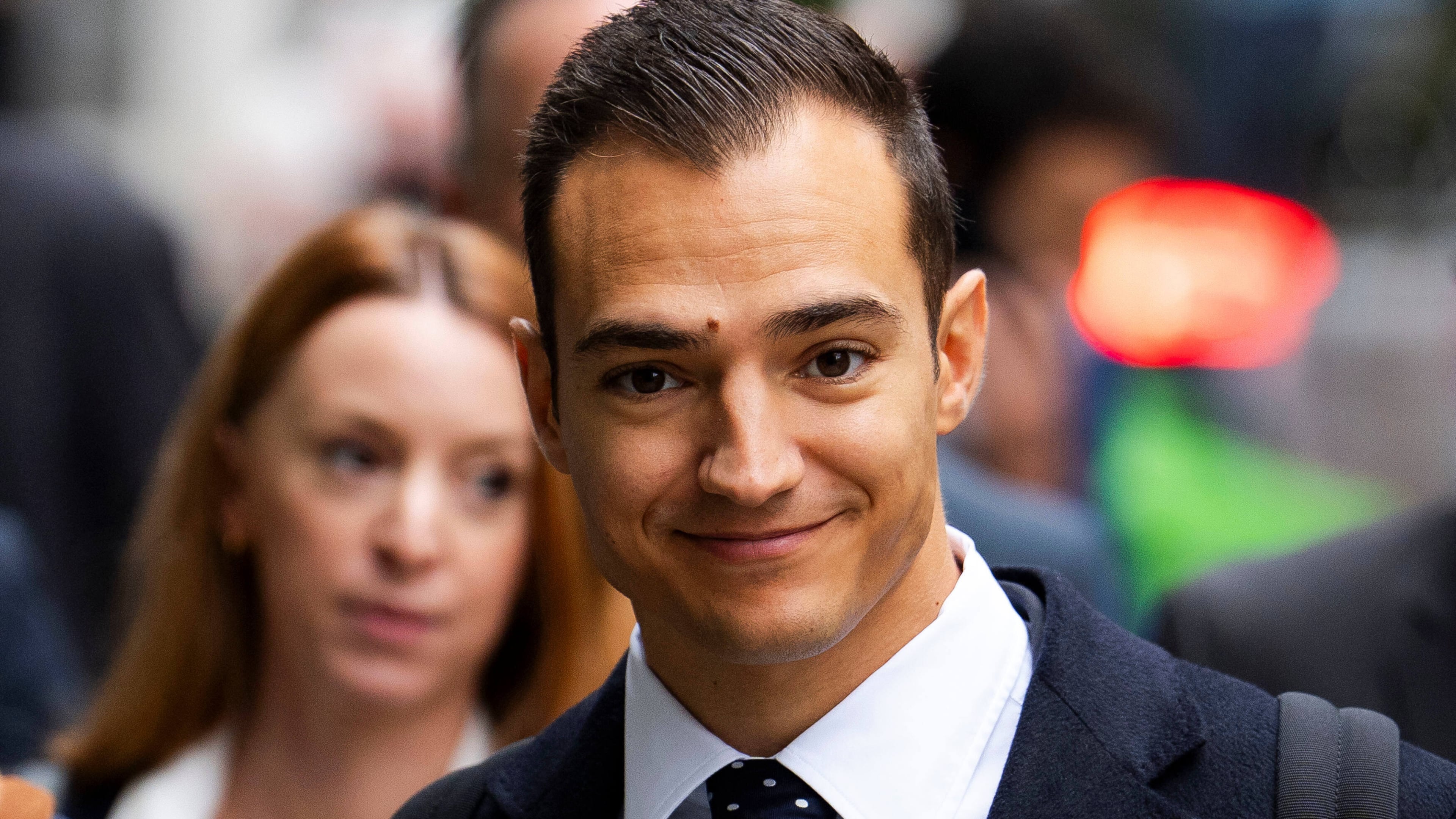 Spanish racing driver Alex Palou, arrives at the Rolls Building of the Royal Courts of Justice to give evidence in McLaren's legal claim against him, in central London, Friday, Oct. 10, 2025. (Jordan Pettitt/PA via AP)