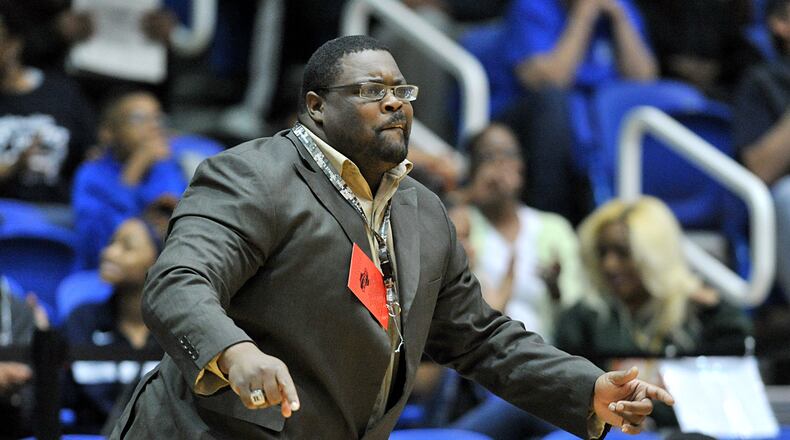 Redan head coach Jerry Jackson reacts as he watches from the sideline in the second half of Class AAAA semifinal game at West Georgia College in Carrollton on Saturday, March 1, 2014. Redan won 60-40 over the South Effingham.
