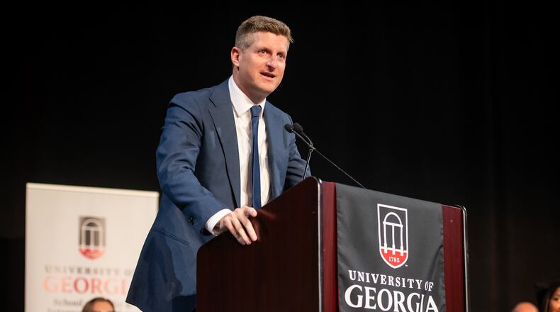 AJC chief political reporter Greg Bluestein delivers the convocation address at the University of Georgia's School of Public and International Affairs on May 8, 2026. (Justin Evans for the AJC)