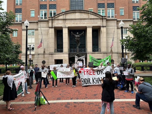 Pro-Palestinian protestors call for the release of Georgetown University scholar Badar Khan Suri, during a hearing for his case at the Federal District Court of the Eastern District of Virginia, in Alexandria, Va., Wednesday, May 1, 2025 (AP Photo/Nathan Ellgren)