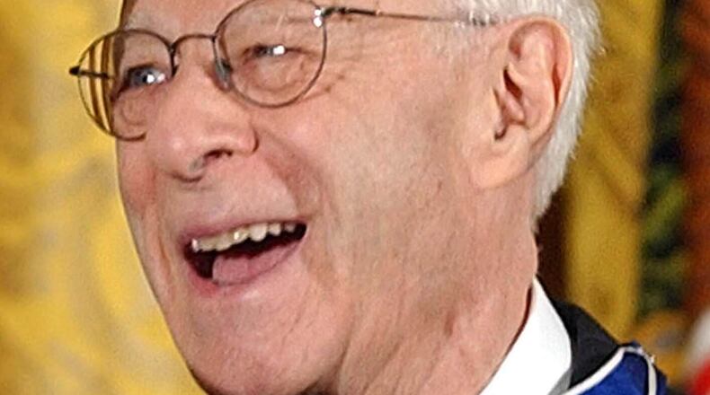 FILE - Norman Podhoretz receives the Presidential Medal of Freedom, the nation's highest civil award, from President Bush during a ceremony in the East Room of the White House, June 23, 2004. (AP Photo/Susan Walsh, File)