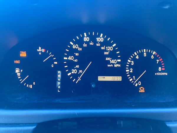 The check engine light and other alerts on the author's 2002 Lexus RX. (Matt Degen for the AJC)