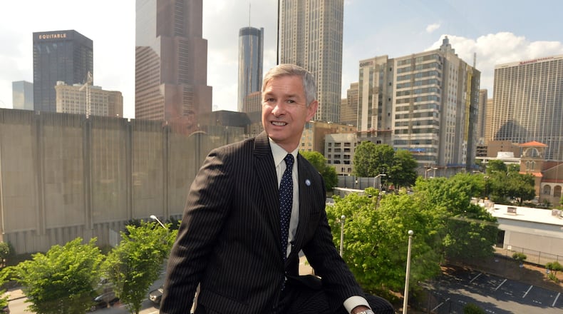 May 13, 2014 Atlanta - Portrait of Georgia State University President Mark Becker at his office on Tuesday, May 13, 2014. Within the past 16 years, Georgia State University has completed projects equal to more than half the size of the Mall of Georgia, not including student housing and sports fields, turning a commuter school into a residential campus. Now president Mark Becker and a development team want to convert 77 acres of Turner Field and its parking lots into a $300 million project that will extend the university’s reach. HYOSUB SHIN / HSHIN@AJC.COM