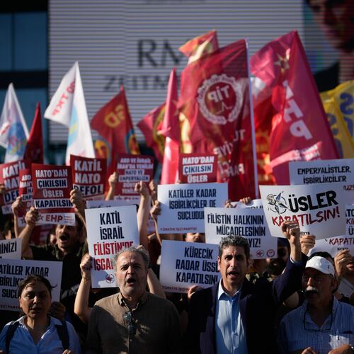 Demonstrators chant slogans and raise placards, during an anti-NATO protest in Istanbul, Turkey, Saturday, June 27, 2026, days ahead of the NATO summit scheduled to be held in Ankara on July 7-8.(AP Photo/Khalil Hamra)