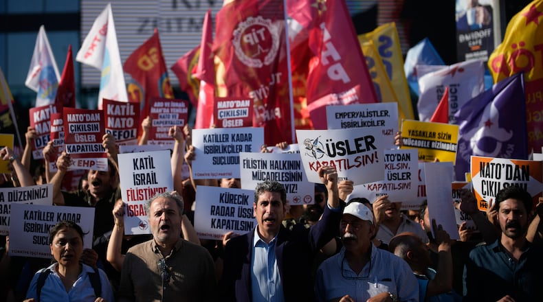 Demonstrators chant slogans and raise placards, during an anti-NATO protest in Istanbul, Turkey, Saturday, June 27, 2026, days ahead of the NATO summit scheduled to be held in Ankara on July 7-8.(AP Photo/Khalil Hamra)