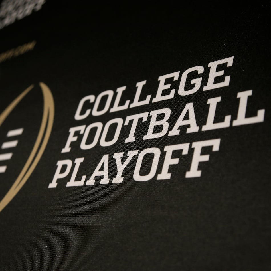 The College Football Playoff logo (AP Photo/Tony Gutierrez)