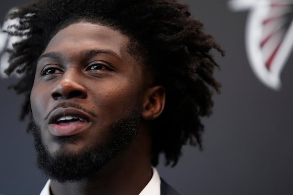 Atlanta Falcons first-round draft pick Jalon Walker speaks during a news conference, Friday, April 25, 2025, in Flowery Branch, Ga. (AP Photo/Brynn Anderson,)