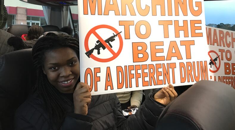 Chioma Anyanwoke, 14, from Cobb County on a bus to the March for Our Lives in Washington.