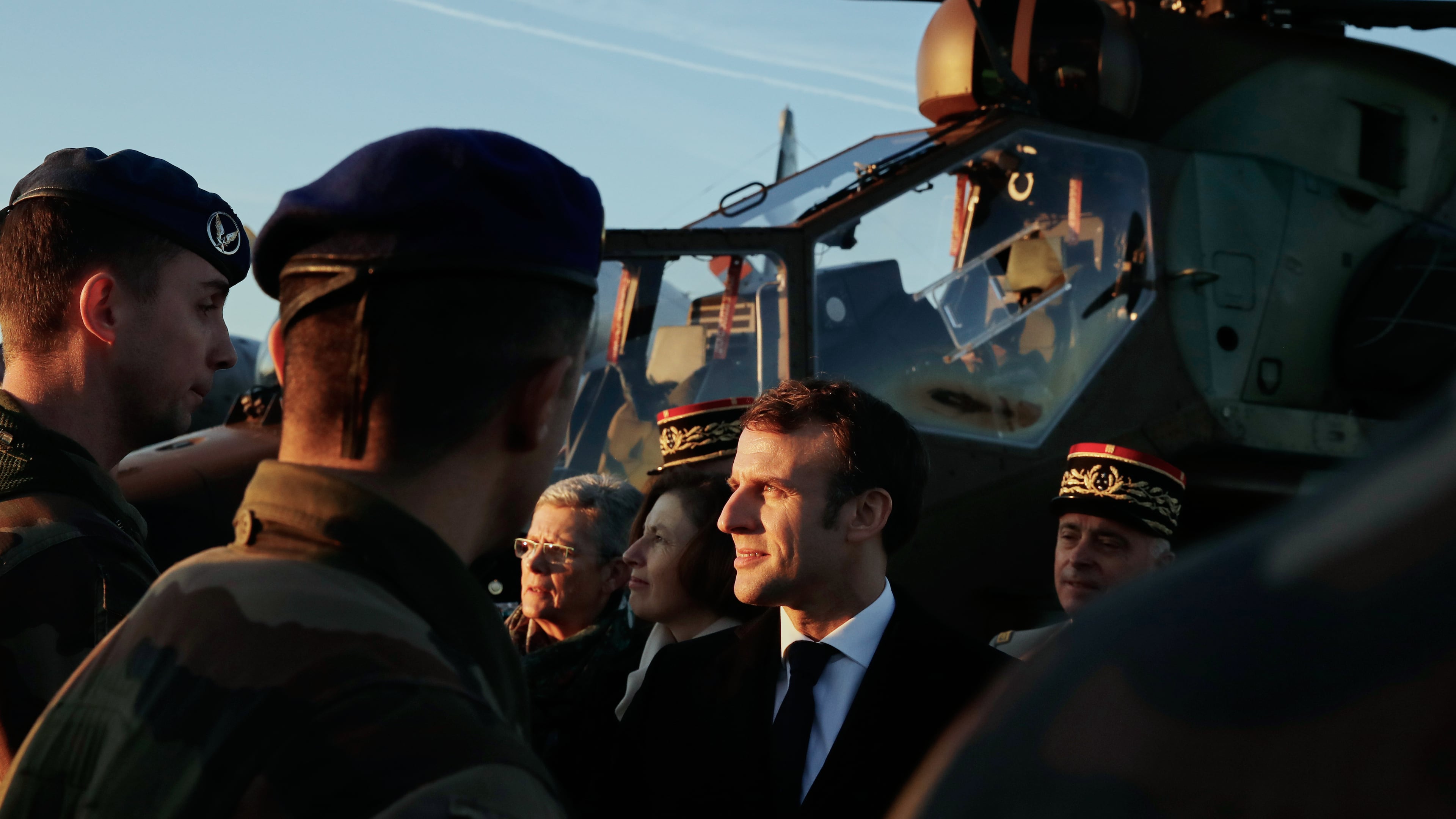 FILE - French President Emmanuel Macron talks to soldiers as he visits an army base in Orleans, central France, Thursday, Jan. 16, 2020. (AP Photo/Christophe Ena, File)