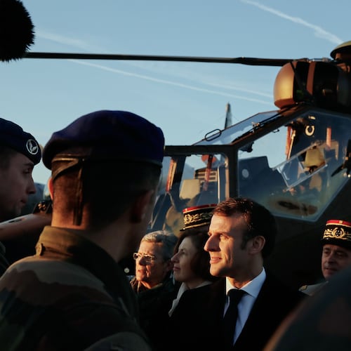 FILE - French President Emmanuel Macron talks to soldiers as he visits an army base in Orleans, central France, Thursday, Jan. 16, 2020. (AP Photo/Christophe Ena, File)