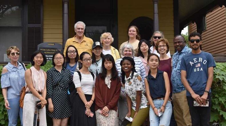 International students involved in the Atlanta Ministry with International Students pose outside the childhood of the Rev. Martin Luther King Jr. The organization helps ease the transition of international college students to the Atlanta area. PHOTO CONTRIBUTED.