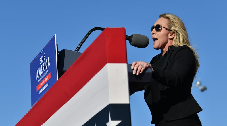 A federal district judge allowed a lawsuit to proceed that aims to remove U.S. Rep. Marjorie Taylor Greene from the ballot, alleging that the congresswoman's actions leading up to and on the day of the U.S. Capitol riot on Jan. 6, 2021, make her ineligible to serve under a provision in the 14th Amendment to the Constitution. (Hyosub Shin / Hyosub.Shin@ajc.com)