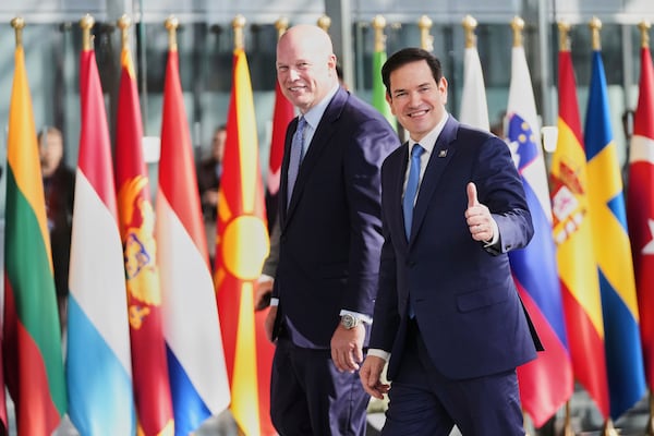 United States Secretary of State Marco Rubio, right, and United States Ambassador to NATO Matthew Whitaker arrives for a meeting of NATO foreign ministers at NATO headquarters in Brussels, Thursday, April 3, 2025. (AP Photo/Virginia Mayo)
