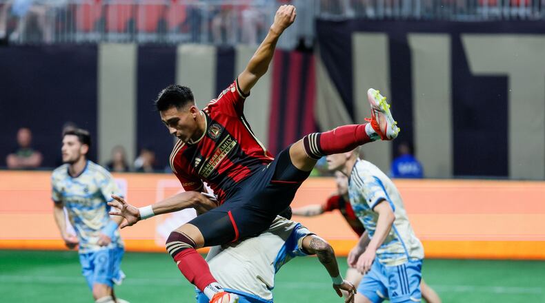 Atlanta United forward Tyler Wolff (28) landed on Philadelphia Union defender Damion Lowe (17) on a play by the box during the first half against the Philadelphia Union on Sunday, April 14, 2024.
Miguel Martinez / miguel.martinezjimenez@ajc.com