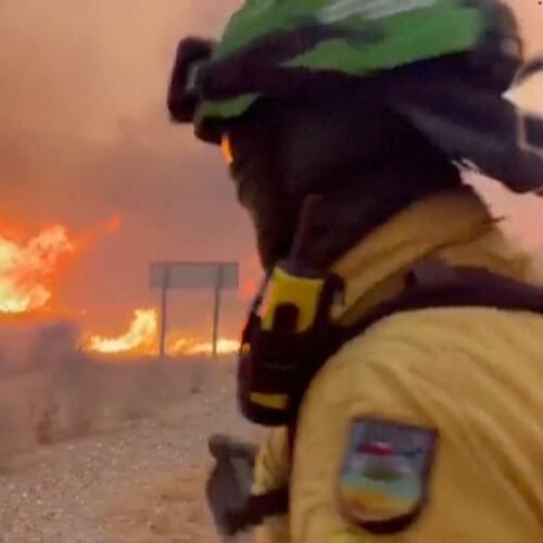 This image made from video provided by INFOCA shows firefighters battling a wildfire near Los Gallardos, Almeria, Spain, on Thursday, July 9, 2026. (INFOCA via AP)