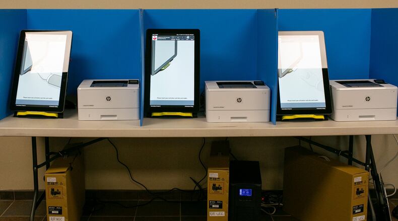 New polling machines wait to be used in October at the Paulding County Municipal Building in Dallas, Ga. Paulding was one of six counties that tested the new machines in last month’s municipal elections. (Photo/Rebecca Wright for the Atlanta Journal-Constitution)