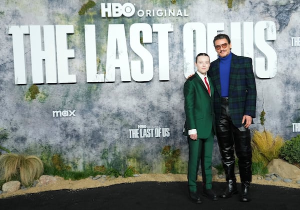 Bella Ramsey, left, and Pedro Pascal arrive at the season two premiere of "The Last of Us" on Monday, March 24, 2025, at TCL Chinese Theatre in Los Angeles. (Photo by Jordan Strauss/Invision/AP)
