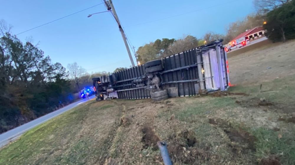 Investigators said they believe a driver fell asleep at the wheel, left the roadway and rolled a box truck, according to the Georgia State Patrol. The driver survived. (Georgia Department of Public Safety)