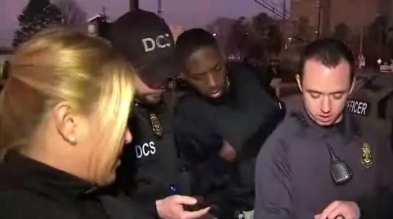 Officials from multiple agencies went door to door Wednesday searching for those who have violated parole or probation. Some are unregistered sex offenders. (Credit: Channel 2 Action News)