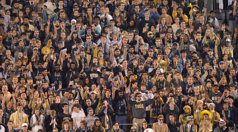 Georgia Tech fans cheer during the first half of an NCAA college football game at Bobby Dodd Stadium on Thursday, November 21, 2019. (Hyosub Shin / Hyosub.Shin@ajc.com)